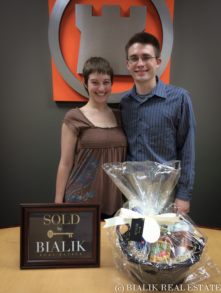 Ryan & Alycia celebrate their Coopersville home sold through Bialik Real Estate