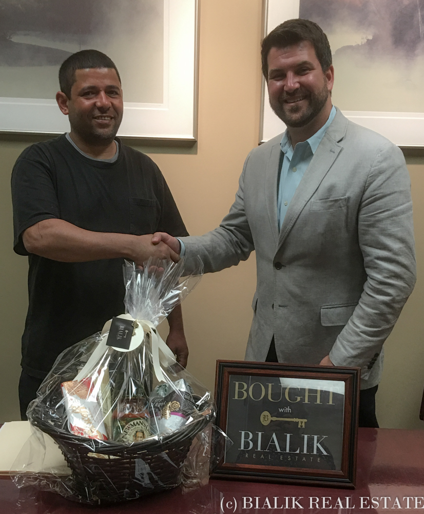 Javier closes on his home bought through Bialik Real Estate