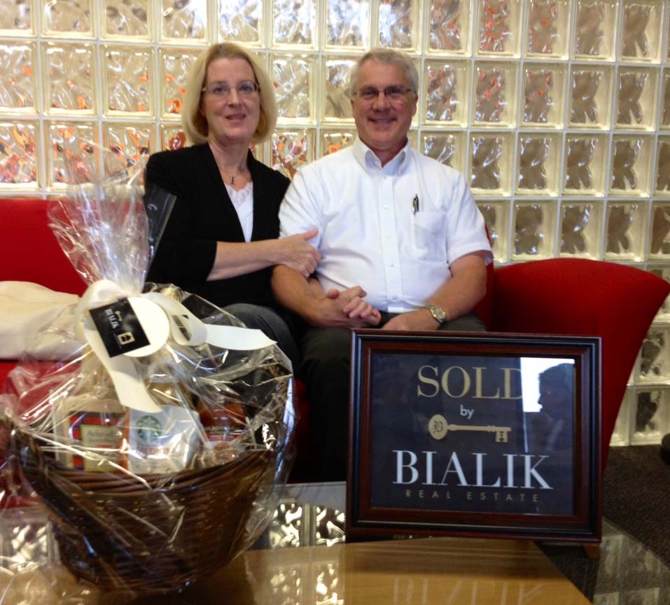 Bruce and Jody celebrating sale of their Bryon Center home