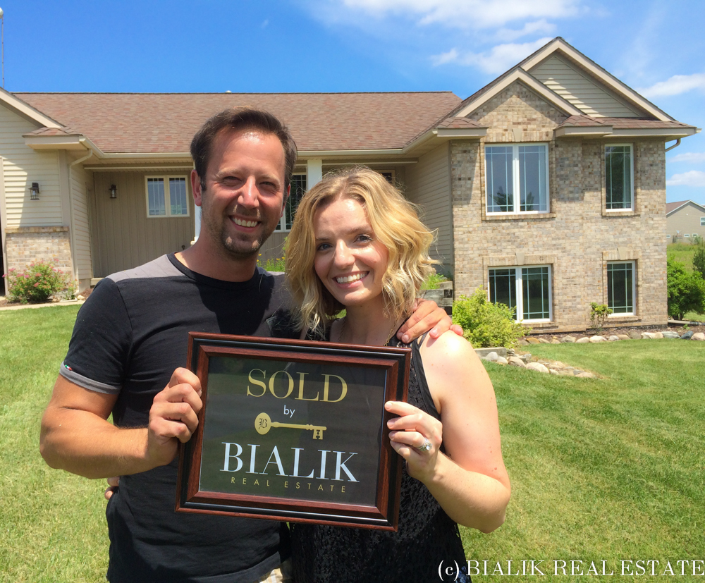 rob & julie close on their hudsonville home, sold by Bialik Real Estate